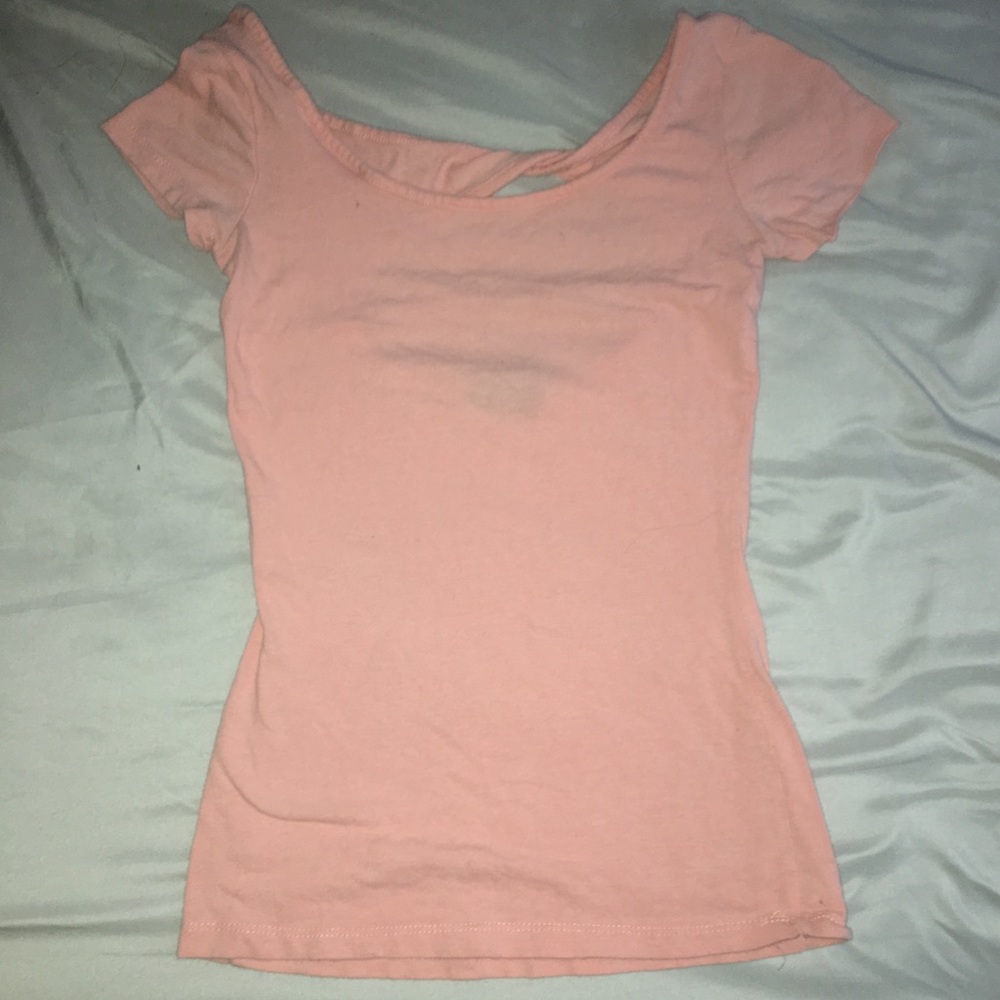 peach colored open back t-shirt